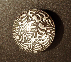 Temp-MetalLentil1-300x262